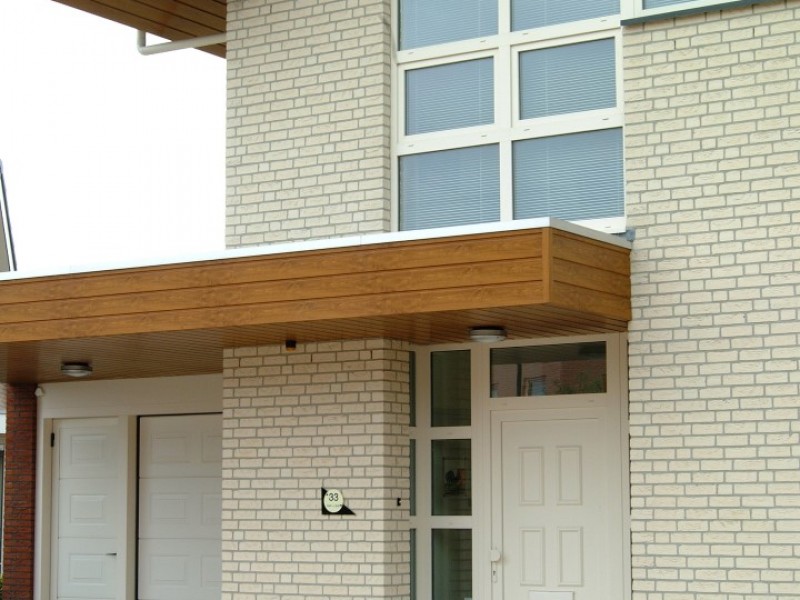 Woning met houten gevelaccenten